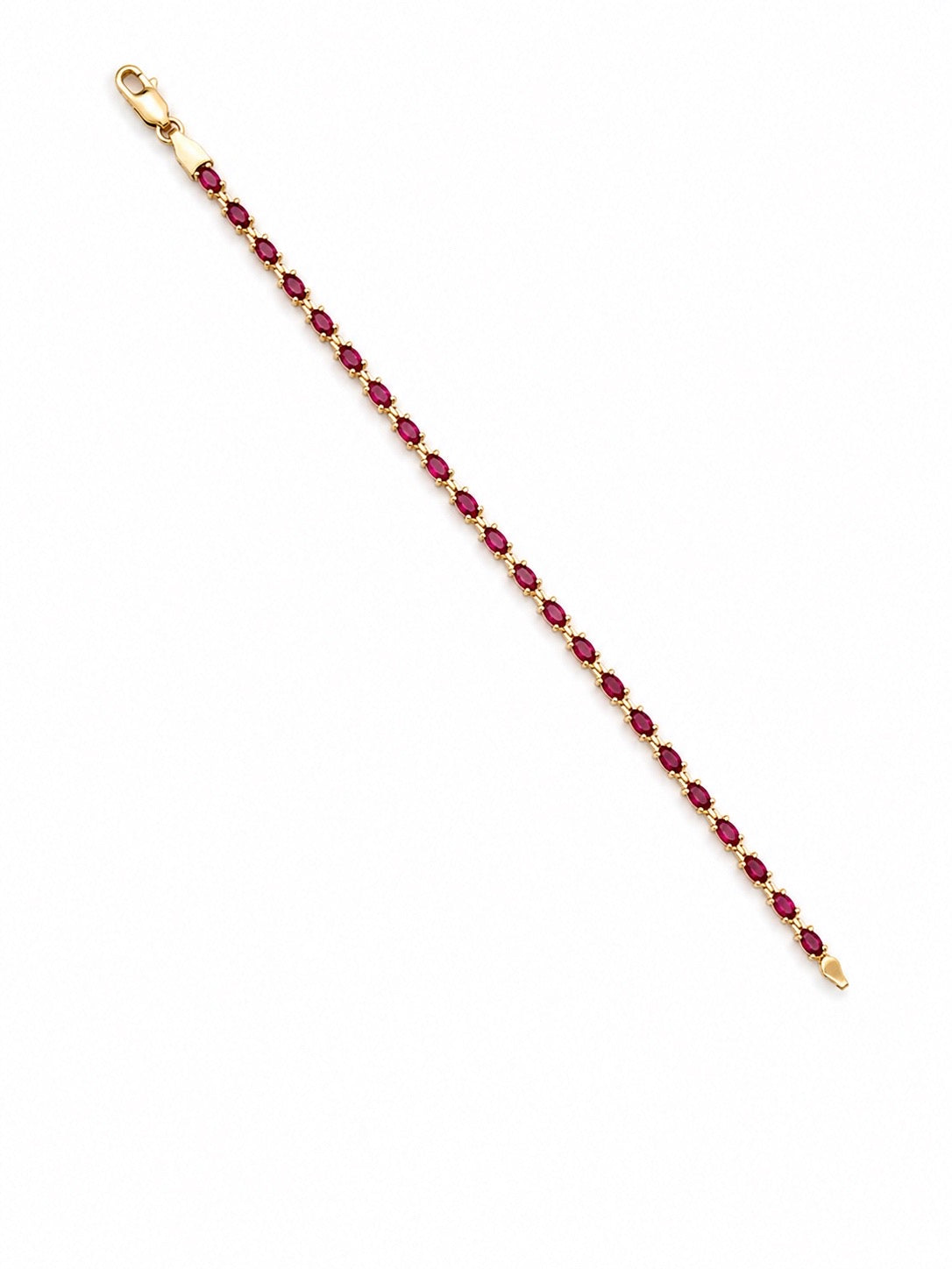 PULSERA EN ORO DE 18K CON RUBIES