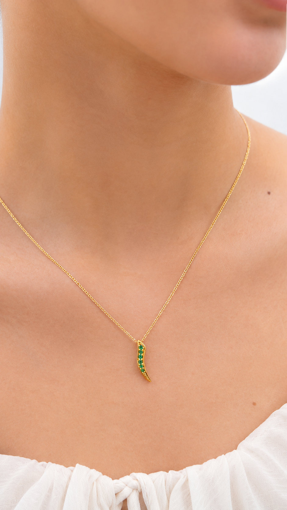 Dije en Oro 18K con Esmeraldas