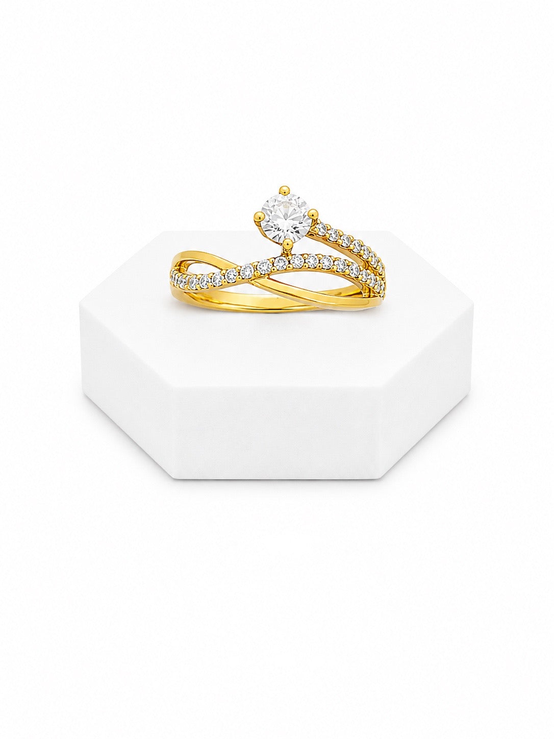 ANILLO EN LINEAS CRUZADAS EN ORO DE 18K