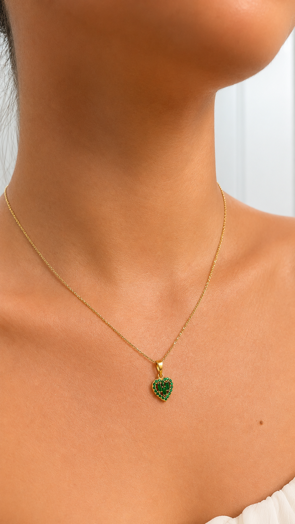Dije Corazón en Oro 18K con Esmeraldas